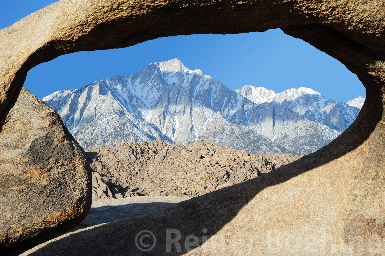 Mt. Whitney through Mobius arch, Alabama Hills – photo by Reiner Boehme