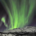 Aurora borealis, caused by solar wind