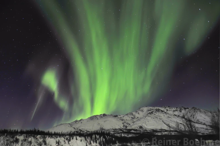 Aurora borealis, caused by solar wind