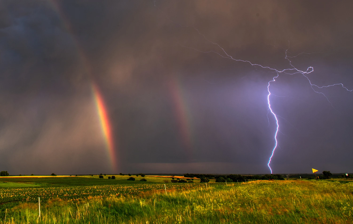 Lightning & rainbows at the same time, Tornado alley 2019 – photo by Reiner Boehme