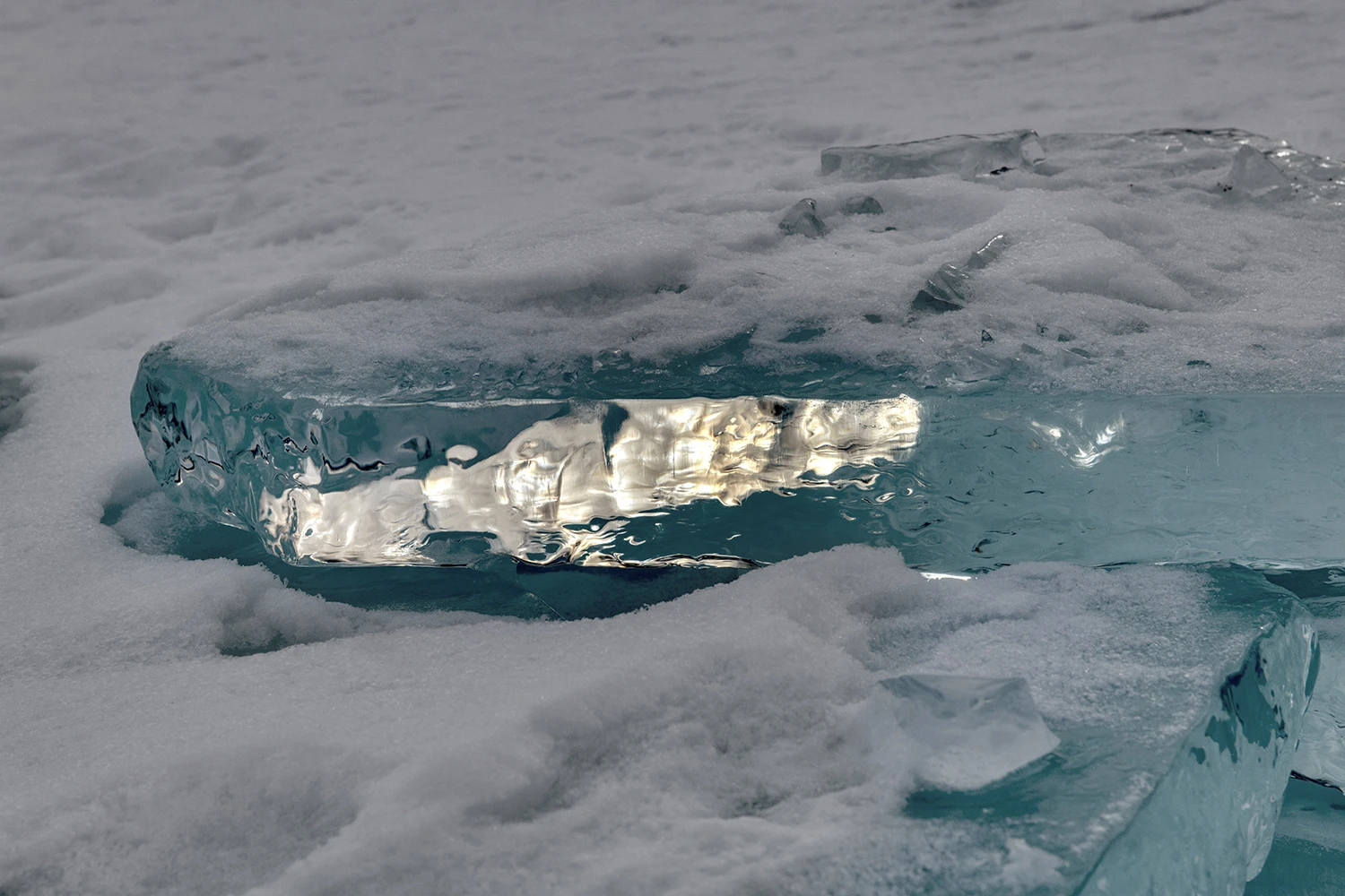 Sunlight reflection, Lake Baikal – photo by Reiner Boehme