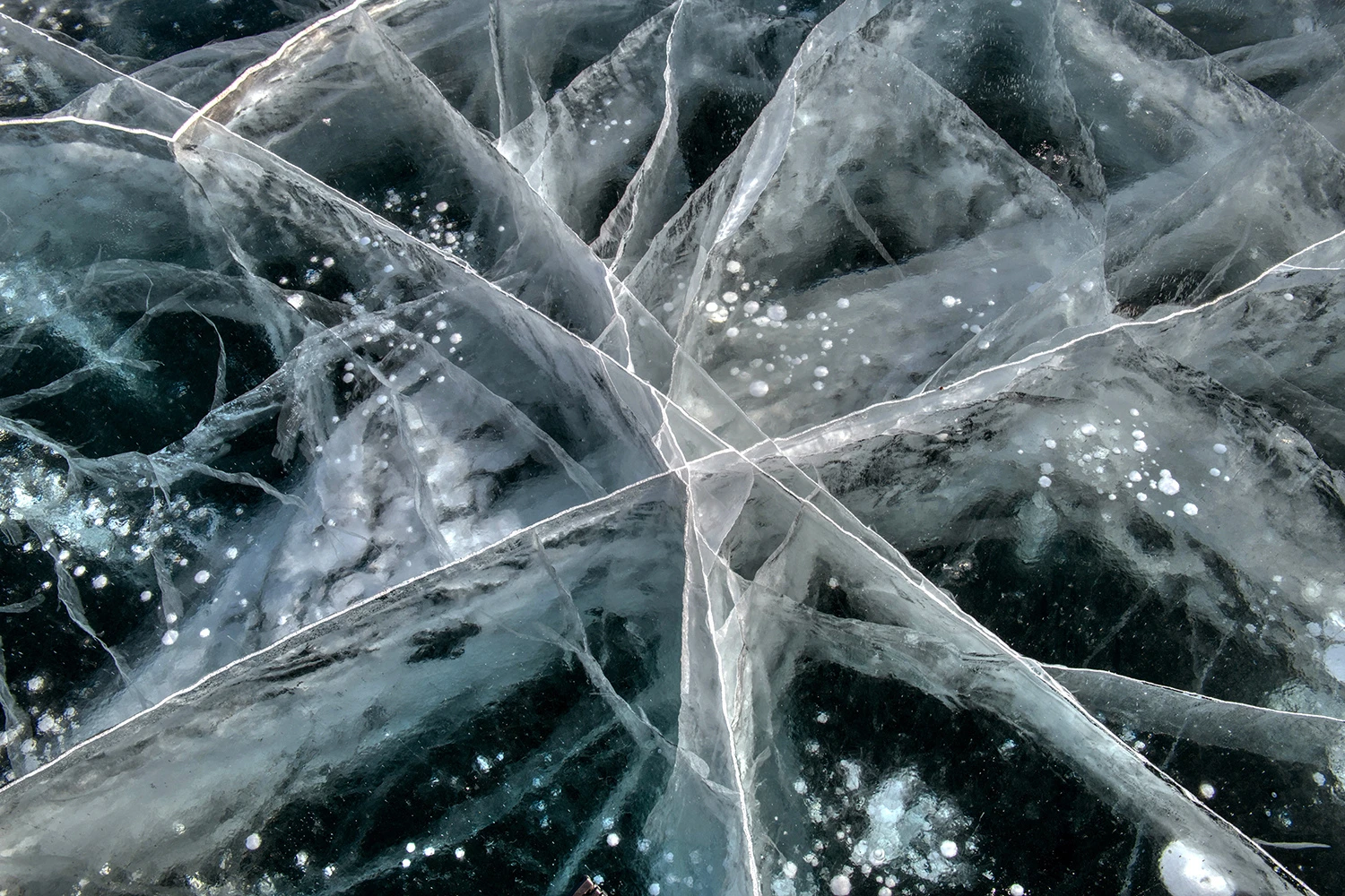 Frozen methane bubbles VII, Lake Baikal – photo by Reiner Boehme