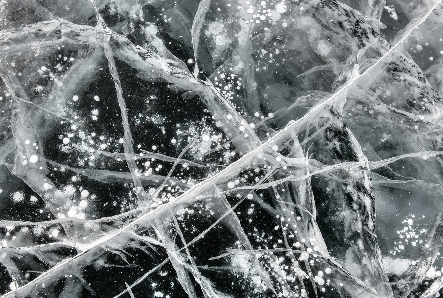 Frozen methane bubbles VI, Lake Baikal – photo by Reiner Boehme