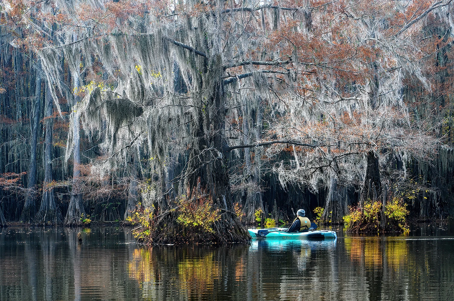 Lone kayak, Swamps of Louisiana/Texas – photo by Reiner Boehme