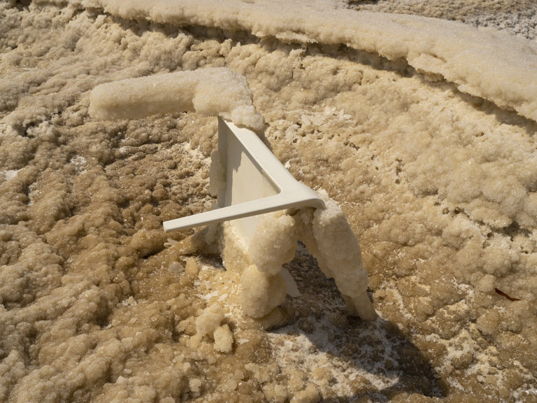 Chair covered by salt over time