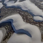 Water streams between the dunes