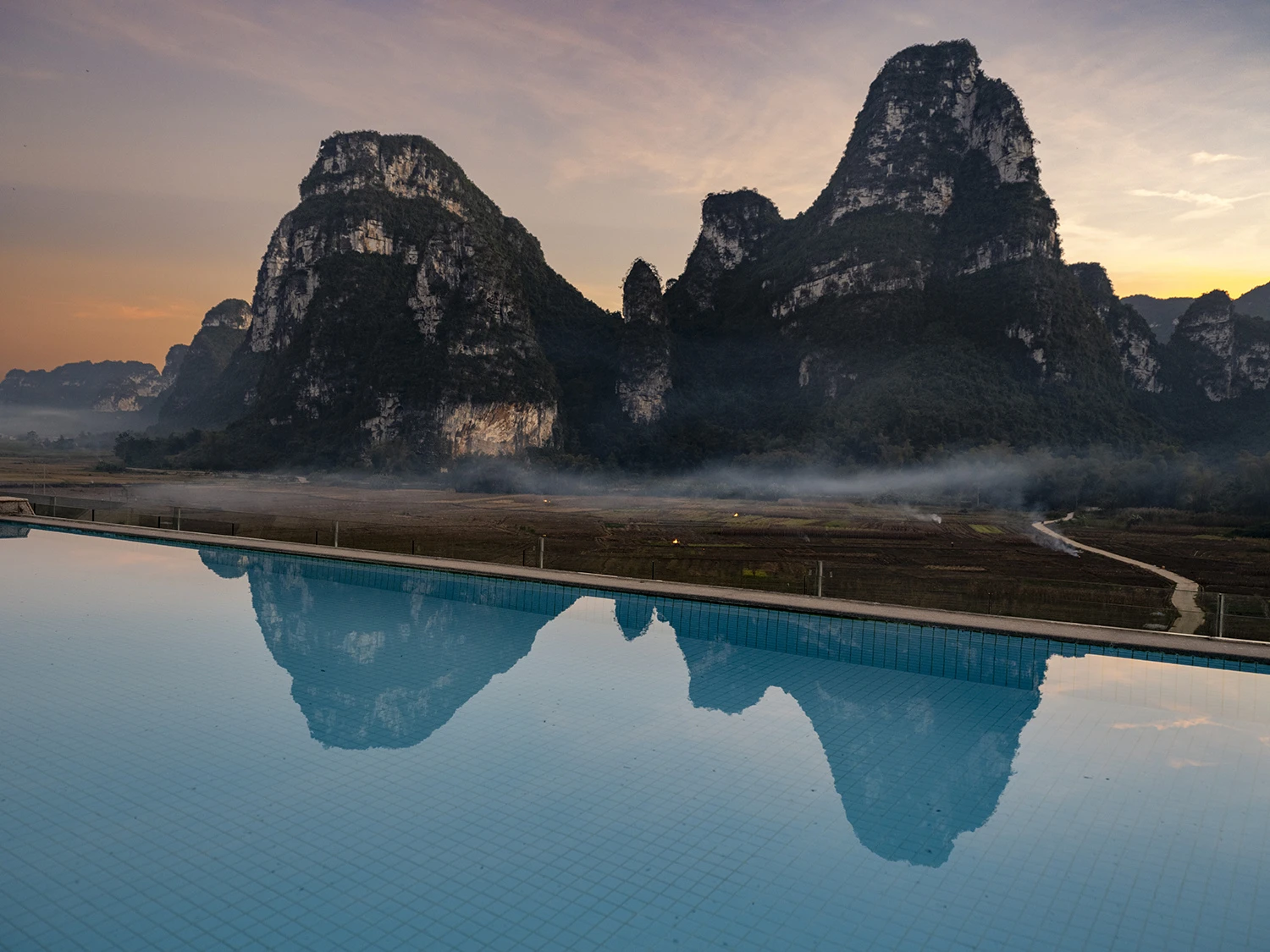 At the pool on top of our hotel, Southwest China – photo by Reiner Boehme