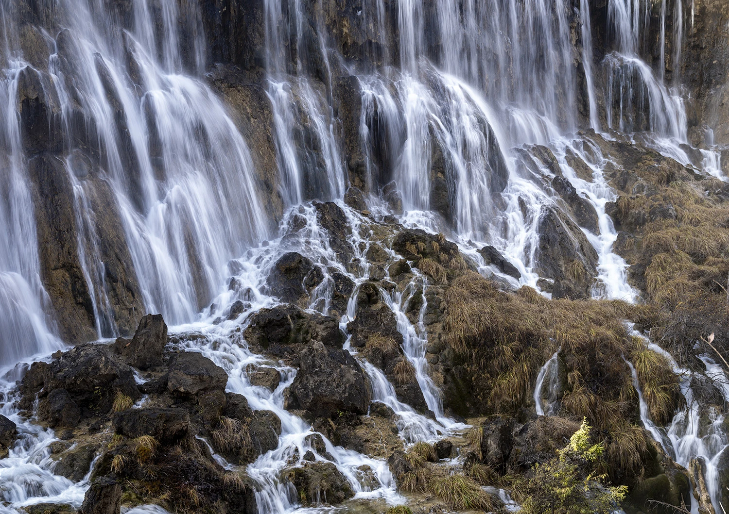 Nuo Ri Lang waterfall detail, Southwest China – photo by Reiner Boehme
