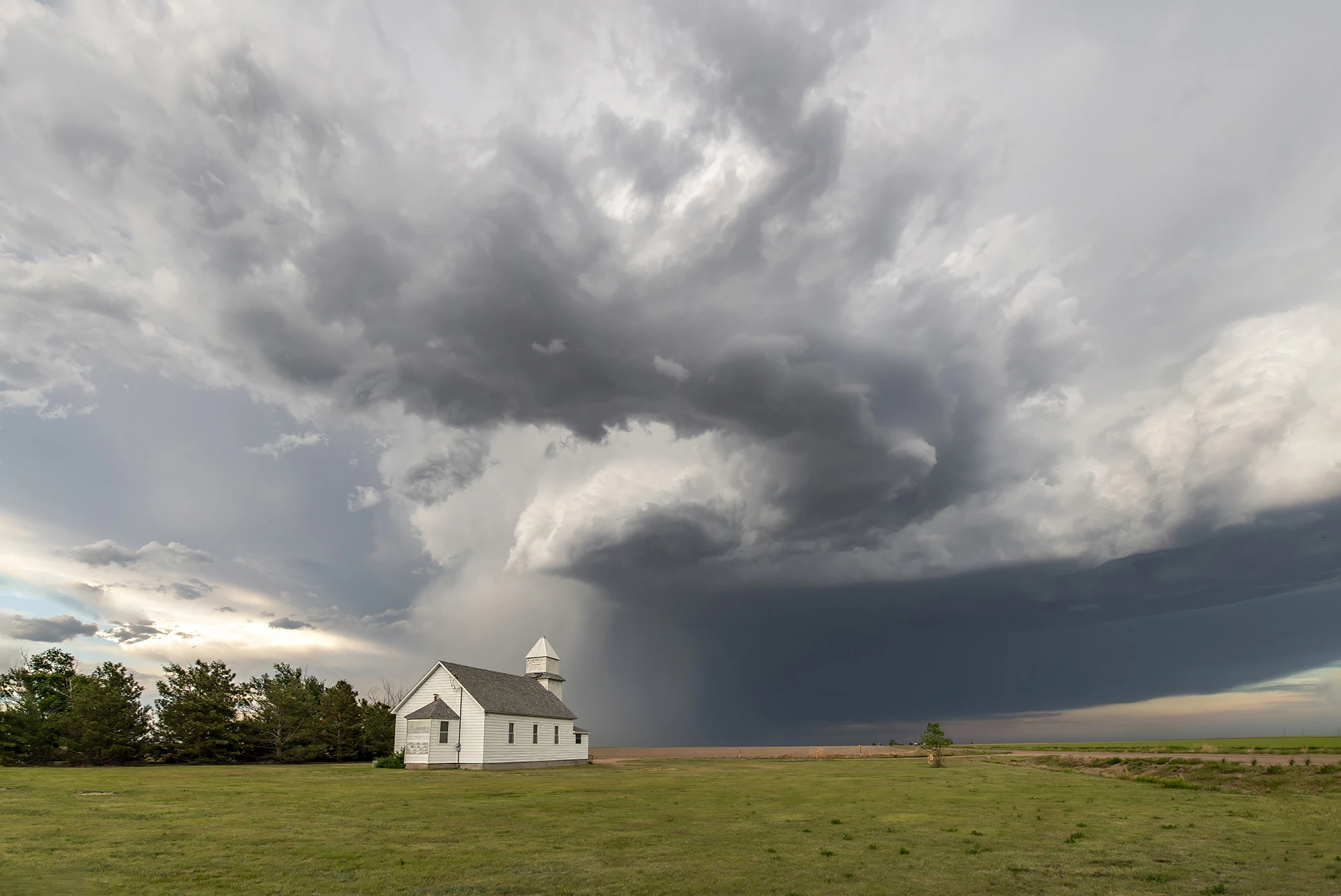 Clouds over church, Tornado alley 2024 – photo by Reiner Boehme