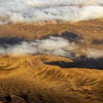 Clouds meet desert