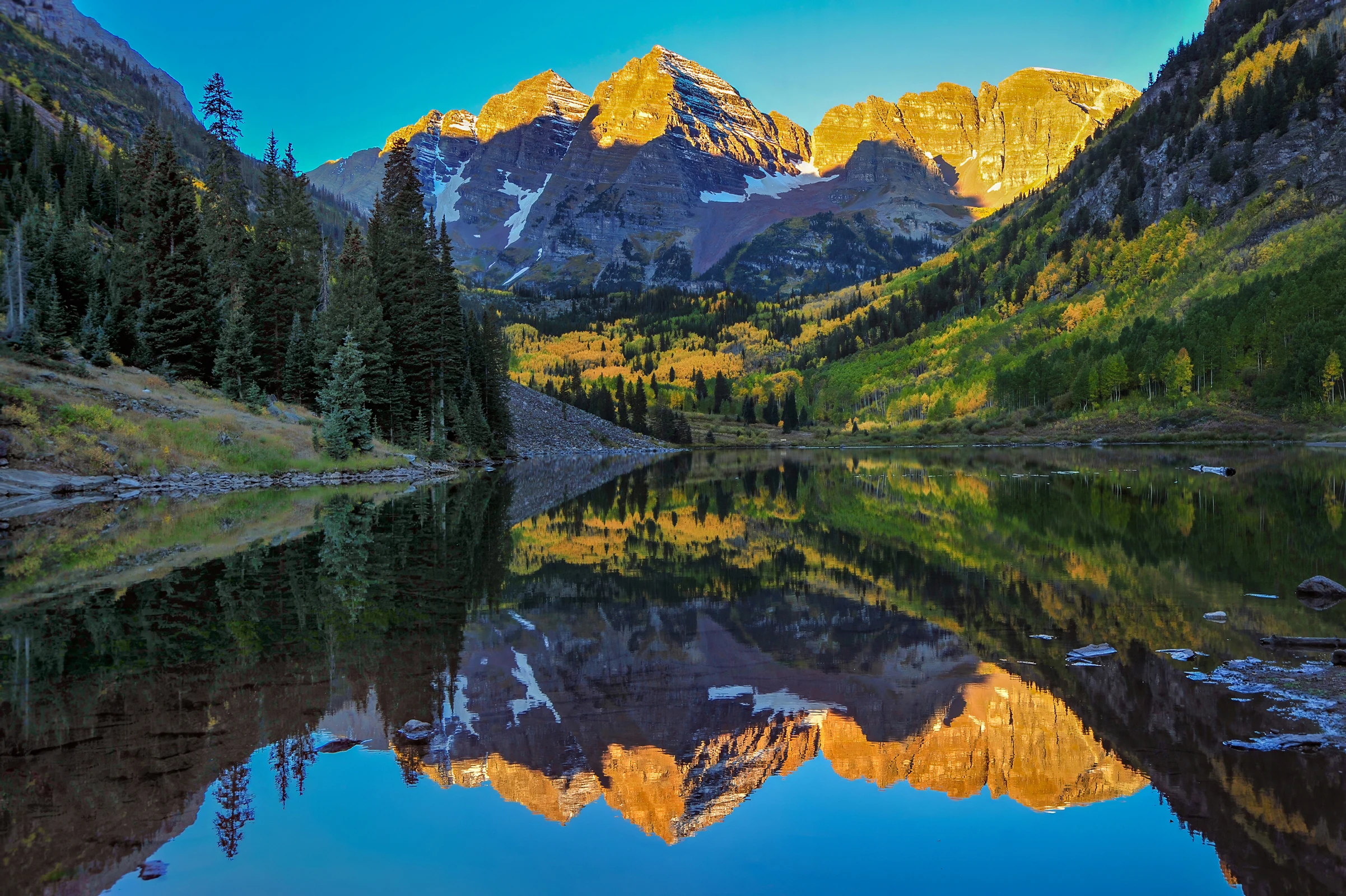 Maroon bells at sunrise, Colorado – photo by Reiner Boehme