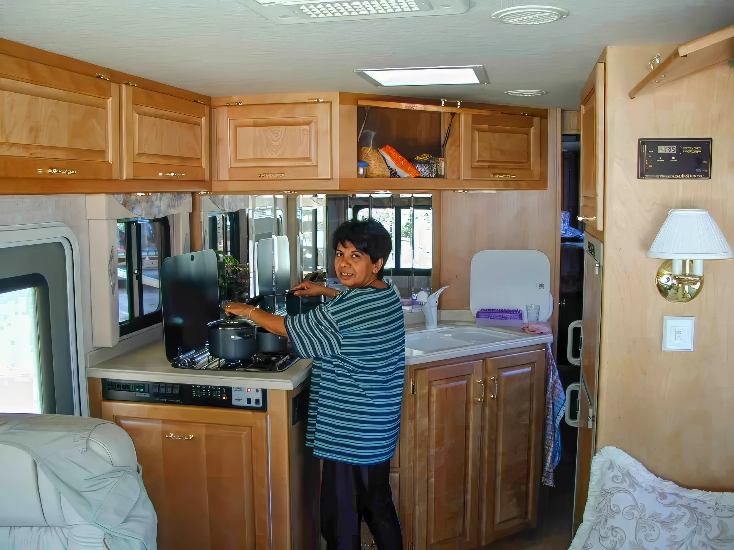 Angel is cooking, Our Motorhome – photo by Reiner Boehme